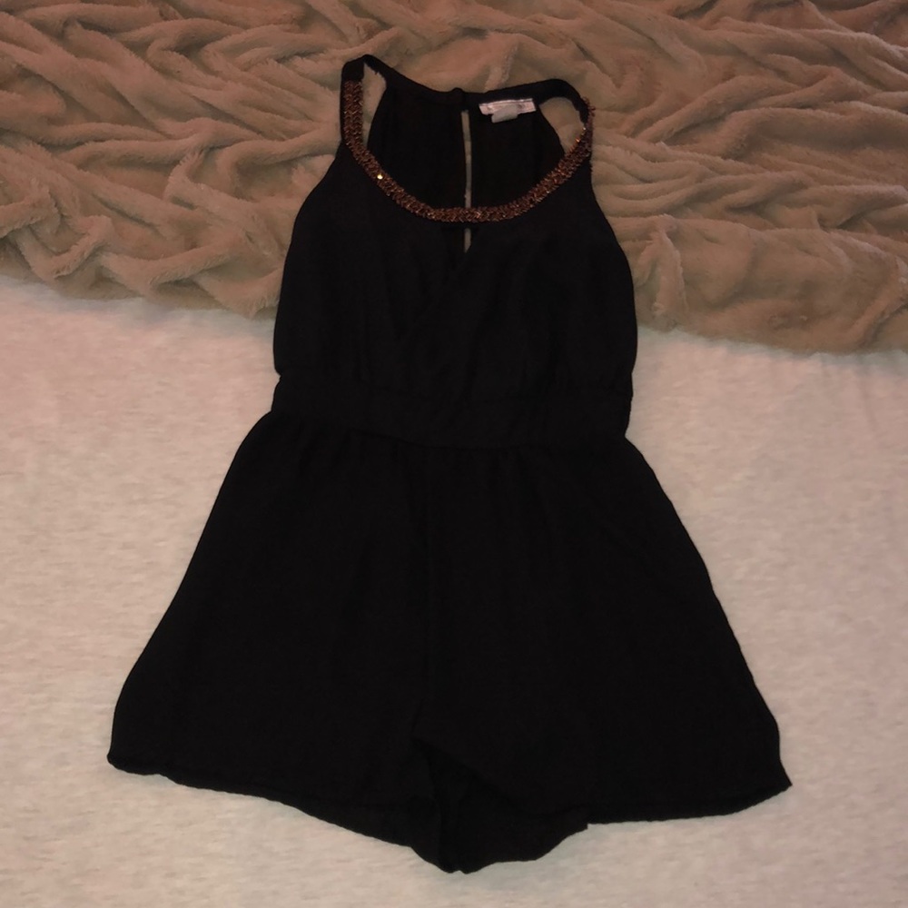Black romper with bronze bead neck